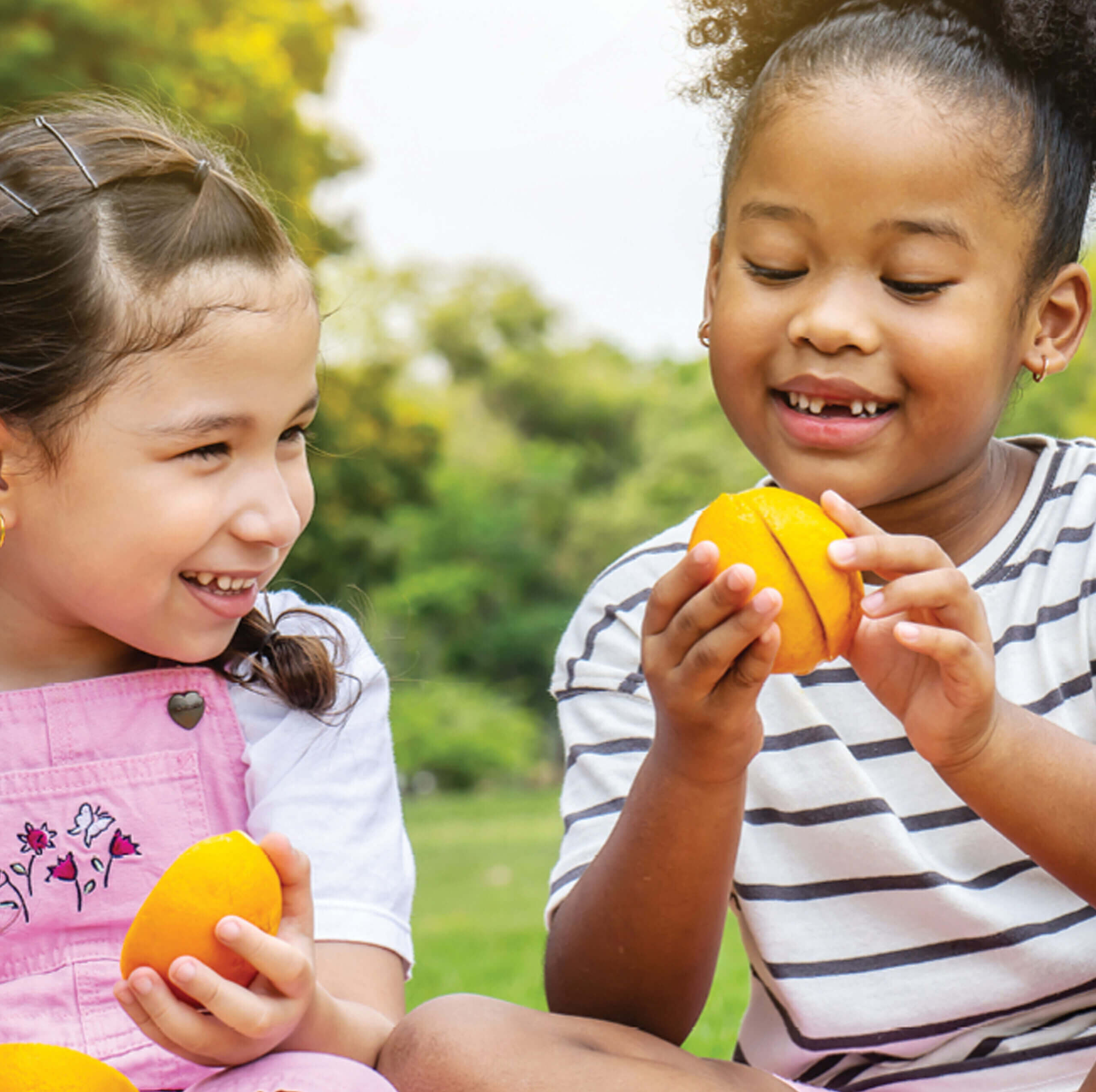 Kids oranges eating vegan scaled